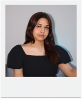 Seba smiling softly at the camera